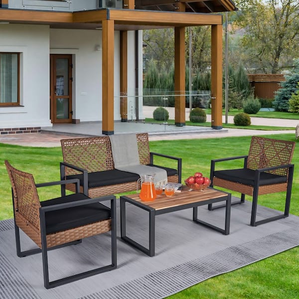 Light Brown 4-Piece Rattan Patio Conversation Set with Acacia Wood Table Top and Black Removable Cushions