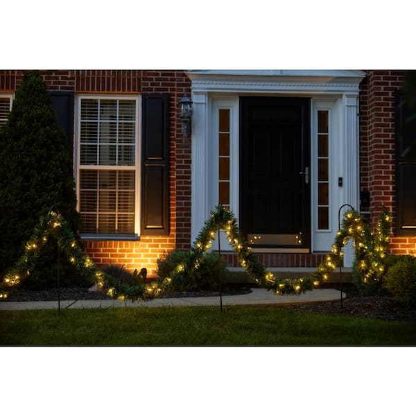 HoliScapes 50 ft. Long Pre-Lit Christmas Garland Pathway Lights 400 5 mm Warm White LED Lights - 6 Shepherds Hooks Included