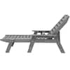 Gray wooden slatted chaise lounge chair viewed from the side.