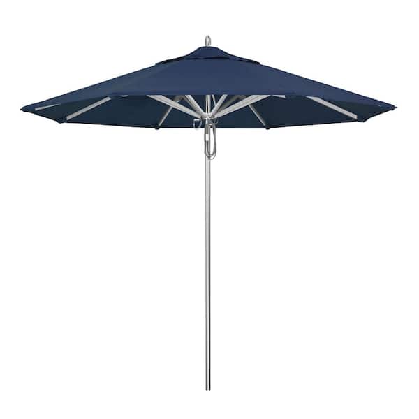 California Umbrella 9 ft. Silver Aluminum Commercial Market Patio Umbrella with Pulley Lift in Spectrum Indigo Sunbrella