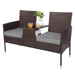 Brown Wicker Outdoor Loveseat with Gray Cushions and Built in Table