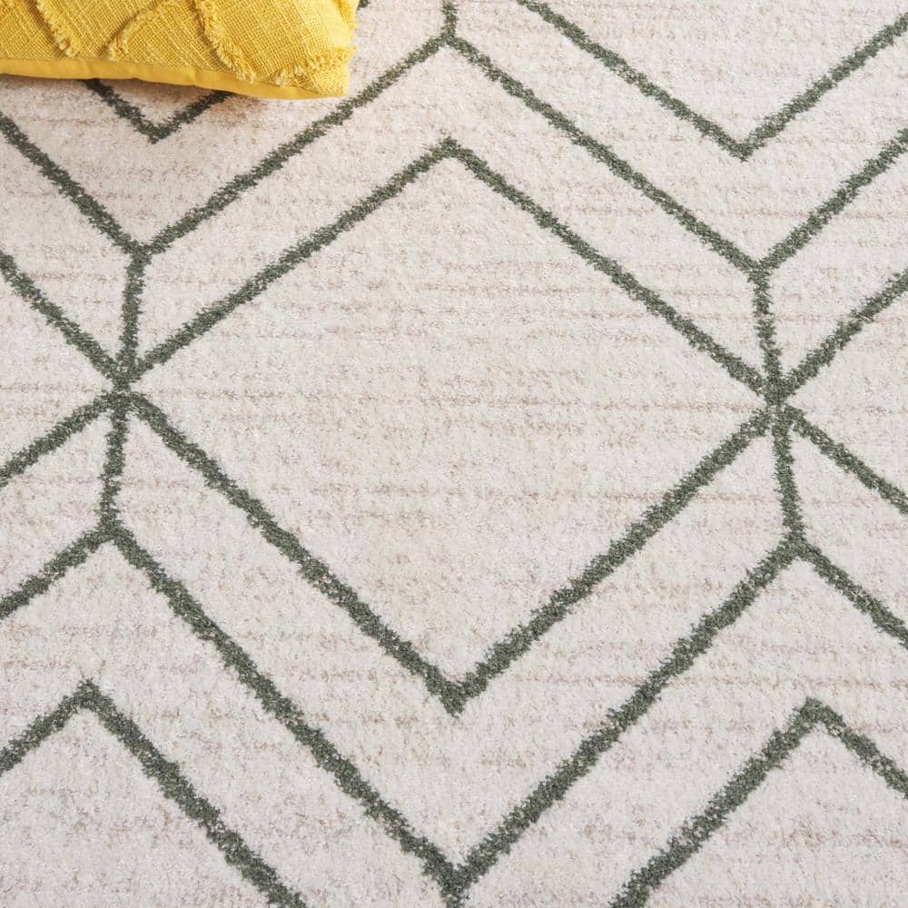 Ivory and Dark Green Geometric Synthetic Area Rug