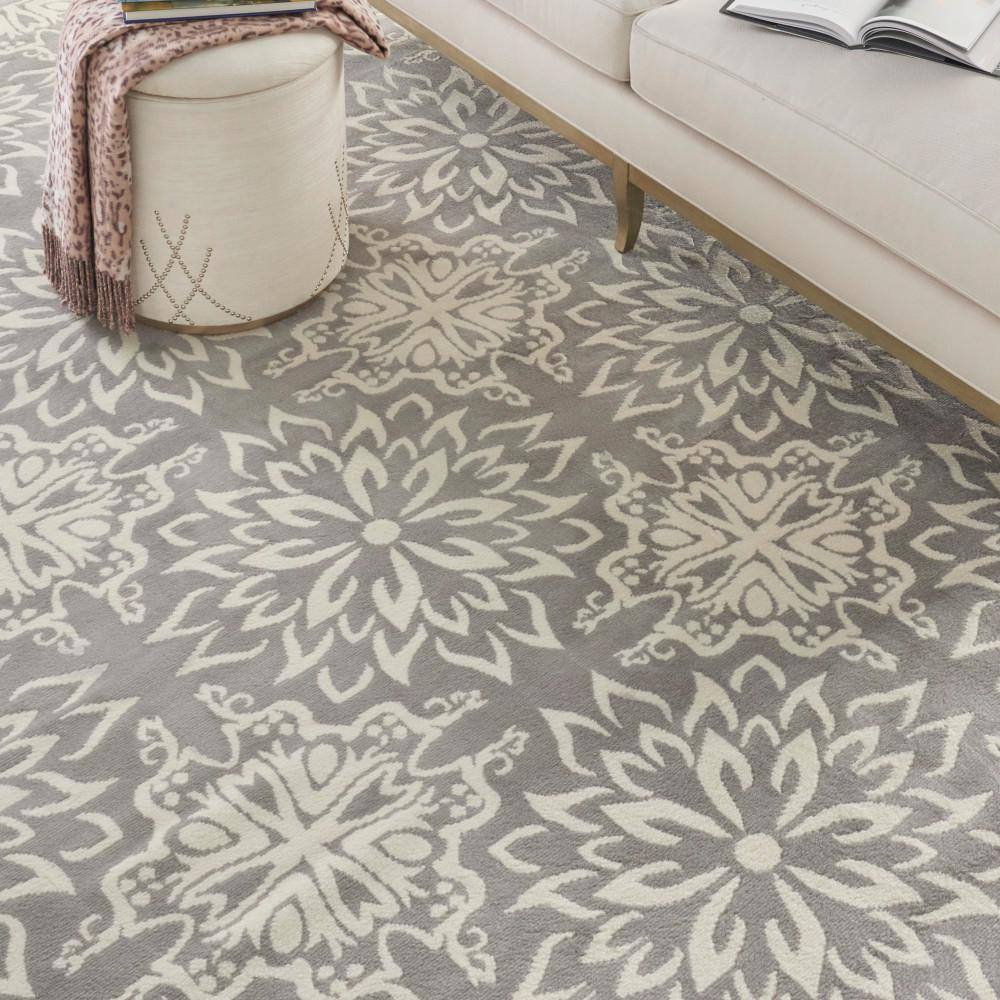 Ivory and Grey Floral Synthetic 7' x 10' Area Rug