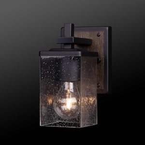 Dakota 4.33 in. 1-Light Matte Black Vanity Light with Dark Faux Wood Accents and Clear Seeded Glass Shade