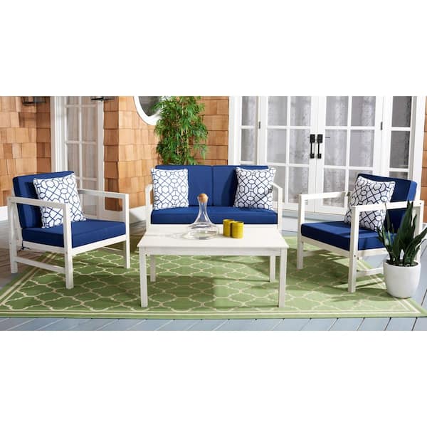 SAFAVIEH Montez White 4-Piece Wood Patio Conversation Set with Navy Cushions and White Geometric Pillows
