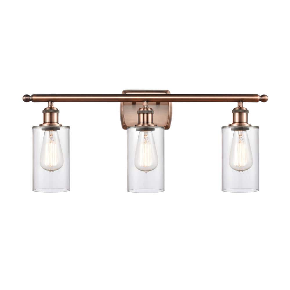 Clymer 26 in. 3-Light Antique Copper Vanity Light with Clear Glass Shade price history on PriceWatchPro