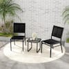 Three black outdoor chairs around a small table on a rug.