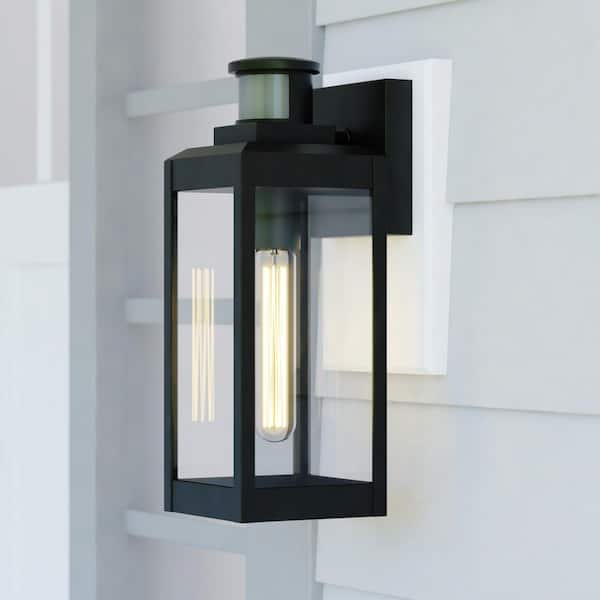 VAXCEL Kinzie Black Motion Sensor Dusk to Dawn Outdoor Wall Light Clear Glass