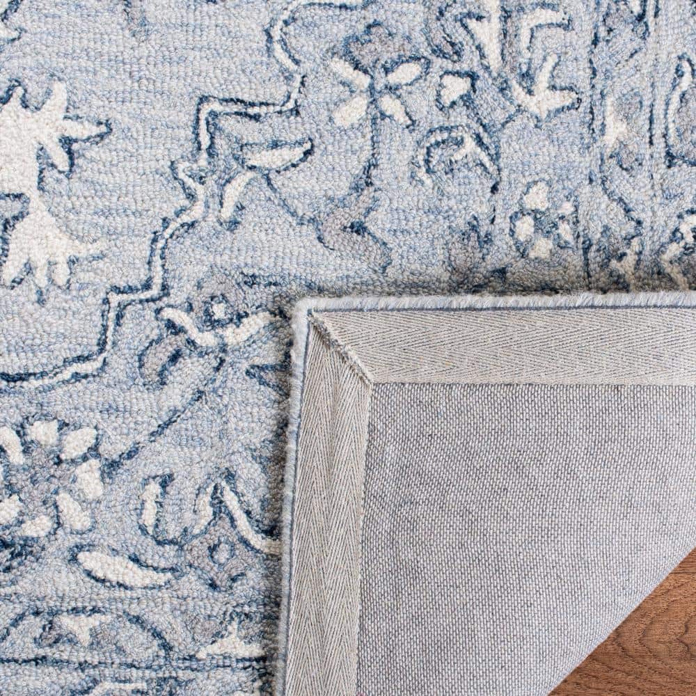 Handmade Tufted Wool Area Rug 9' x 12' in Light Blue and Ivory
