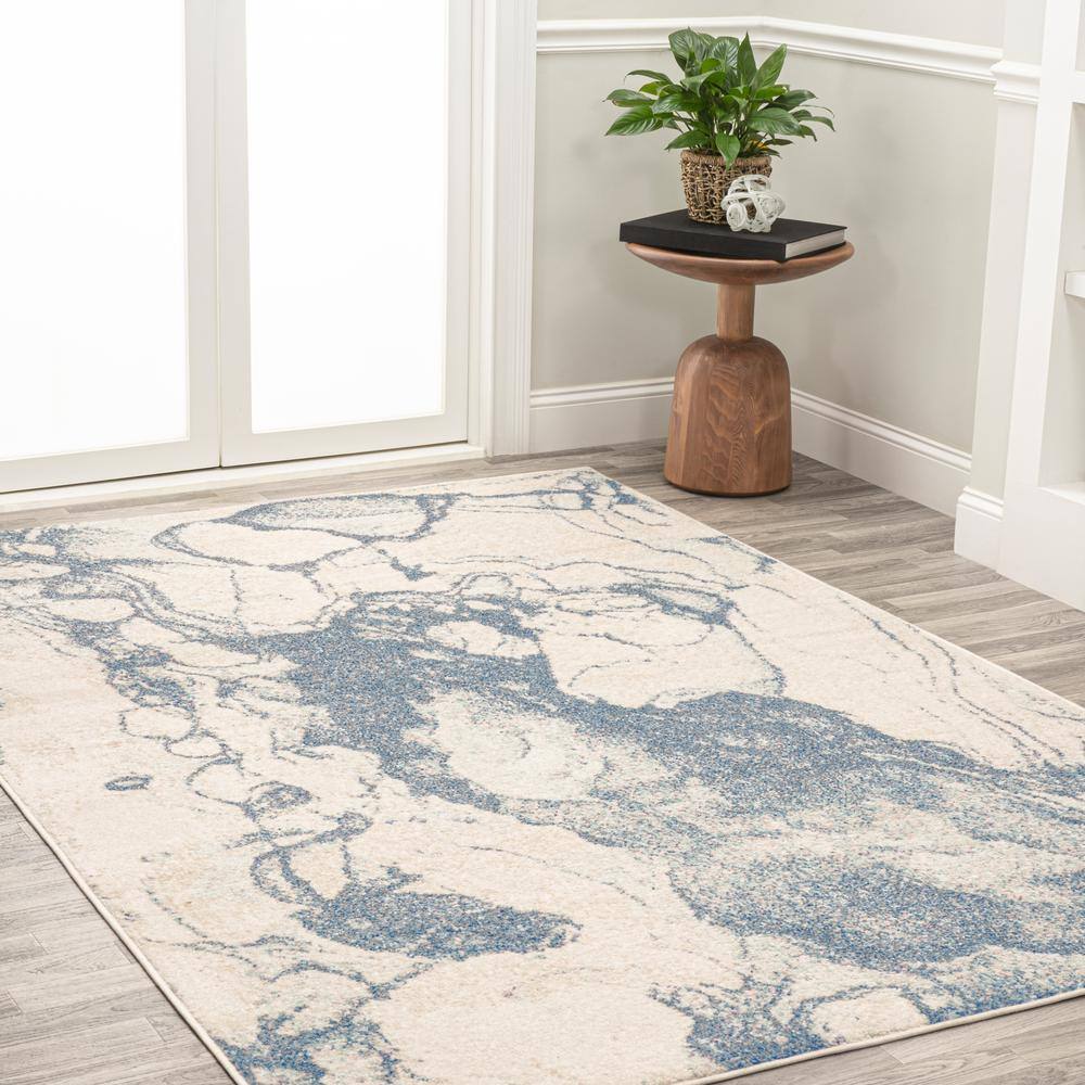 Blue and Cream Abstract 8' x 10' Synthetic Area Rug