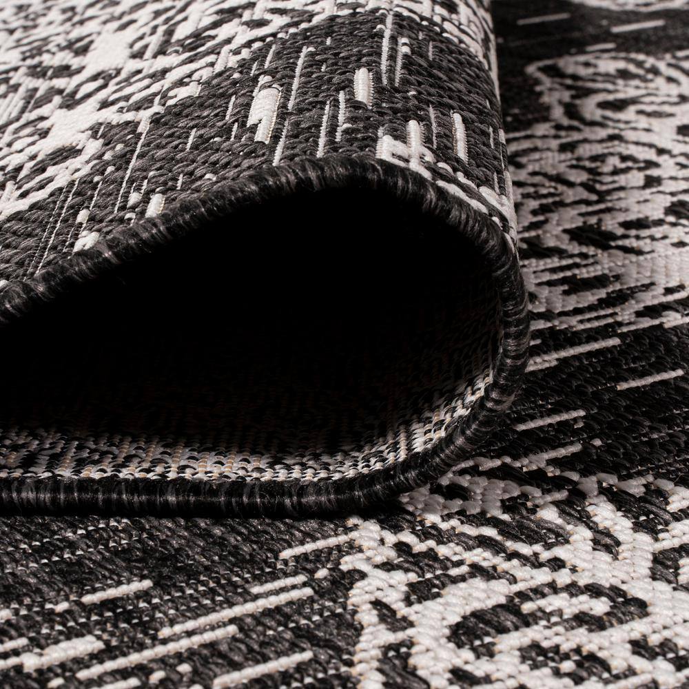 Tuscany Black and Ivory Synthetic Medallion Area Rug