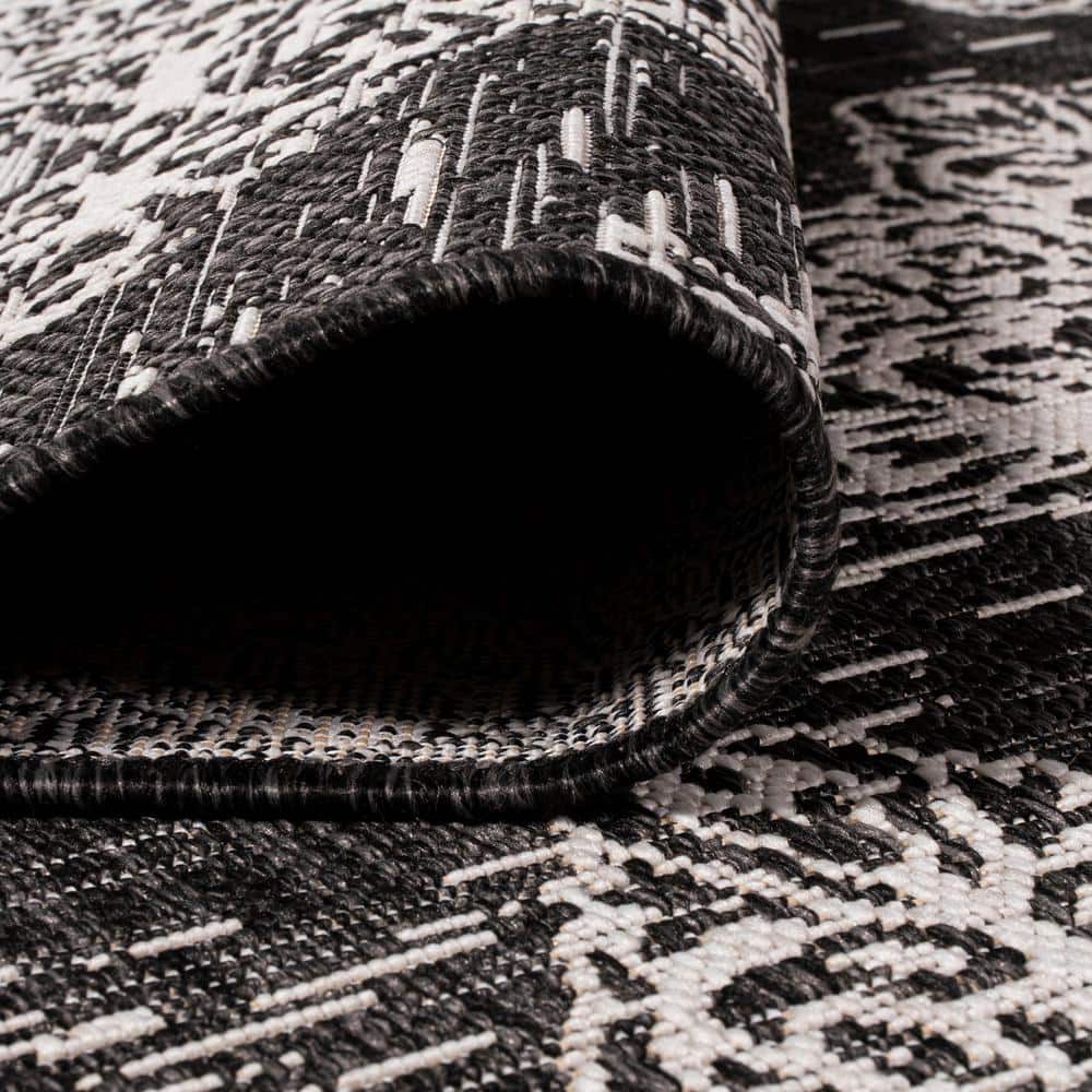 Black and Ivory Medallion Synthetic 8' x 10' Indoor/Outdoor Rug
