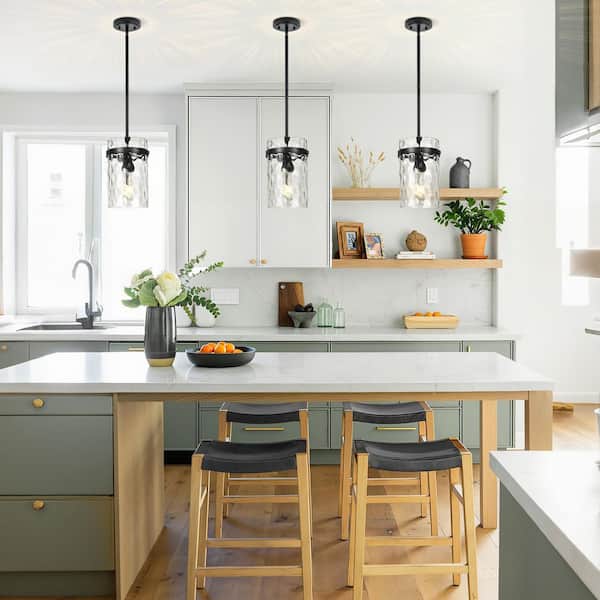 Modern Black Adjustable Kitchen Island Pendant Light with Medium 5. 1in Diameter Clear Hammered Glass Shade