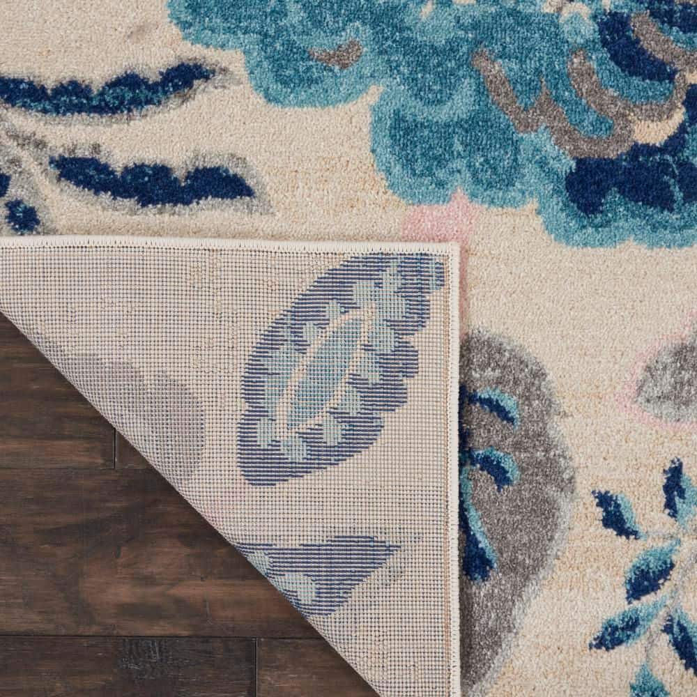 Elegant Ivory and Light Blue Floral 8' x 10' Synthetic Area Rug
