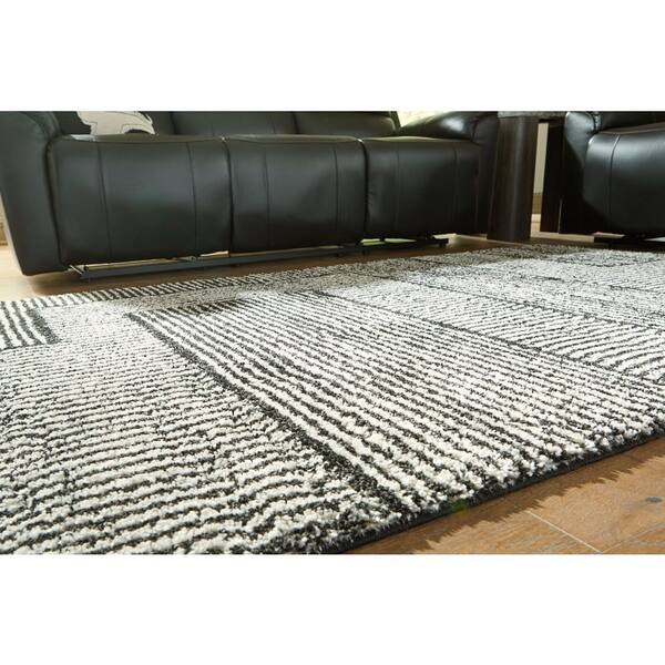 Kurtmen 5 ft. x  7 ft. Black/Beige Geometric Area Rug