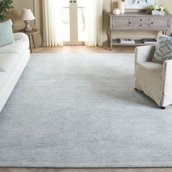 Ebony 6 ft. x 9 ft. Turquoise/Ivory Solid Color Area Rug