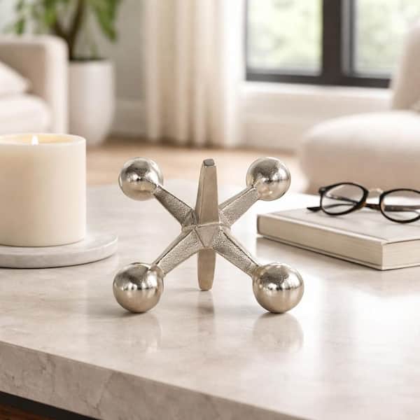 Liv & Skye Silver 7 in. x 5 in. Metal Jacks Abstract Sculpture