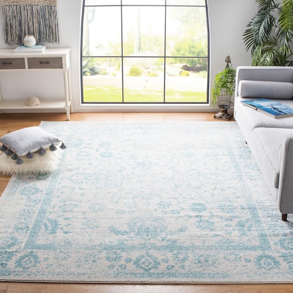 Adirondack Ivory/Light Blue 10 ft. x 14 ft. Border Distressed Area Rug