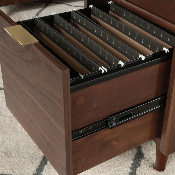 https://images.thdstatic.com/productImages/5ea831f0-add6-4dba-af97-56d929a983d6/svn/grand-walnut-sauder-executive-desks-430761-fa_600.jpg