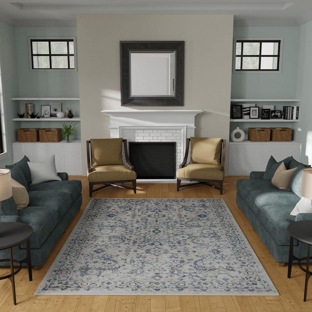Cream and Blue Floral Border 6' x 9' Synthetic Area Rug