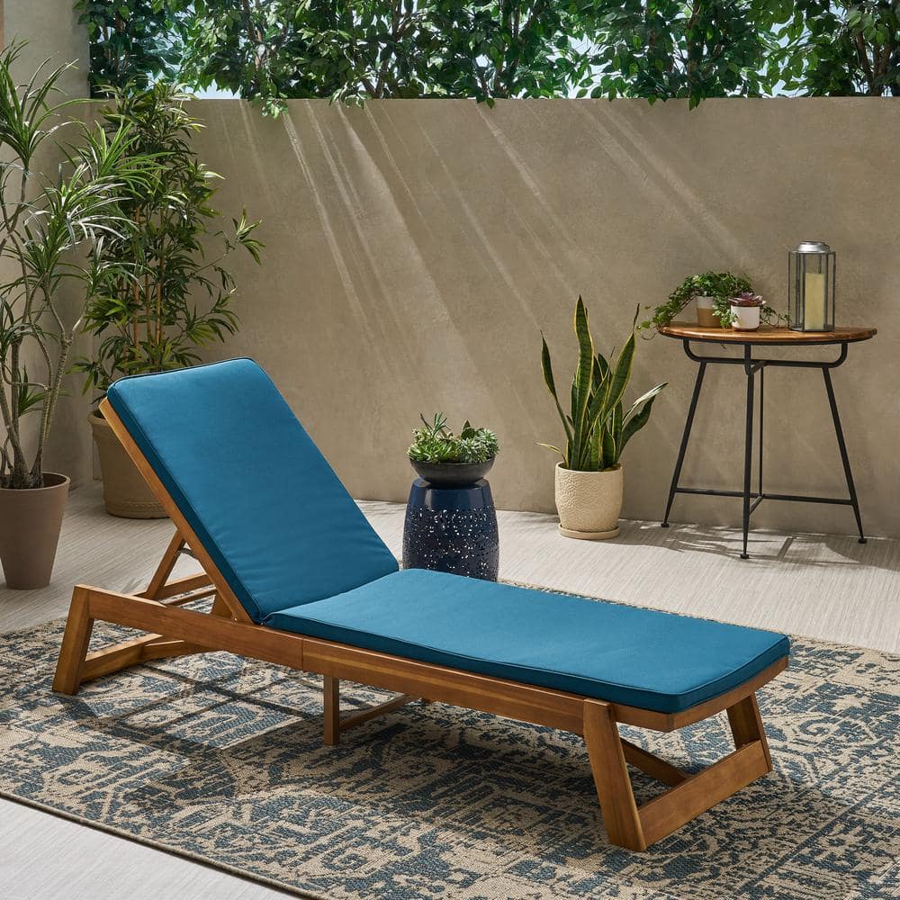 Teak Brown Wood Chaise Lounge with Blue Cushions