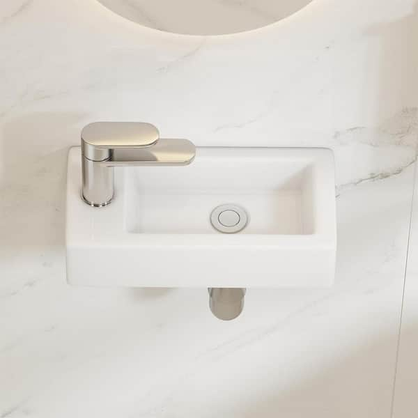 https://images.thdstatic.com/productImages/5eca2532-bb74-4869-8980-3c671b61b0b4/svn/crisp-white-eridanus-wall-mount-sinks-eri-wb-101sl-64_600.jpg