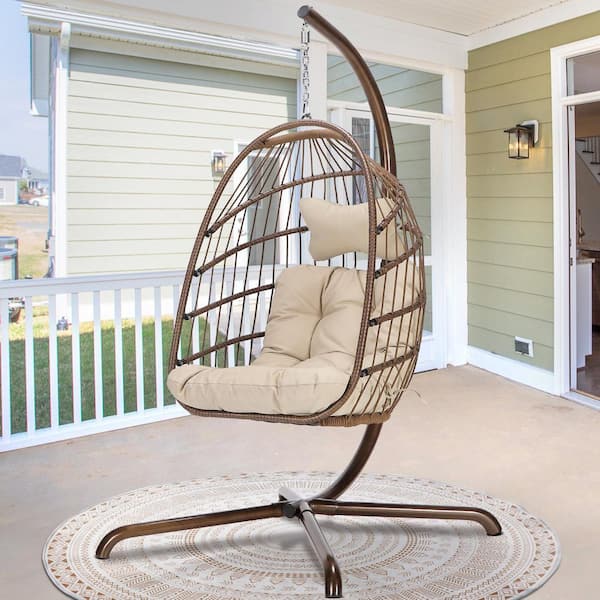 FINCATI Foldable 350 lbs. 1 Person Brown Wicker Porch Swing Egg Chair with Gold Stand Beige Cushions
