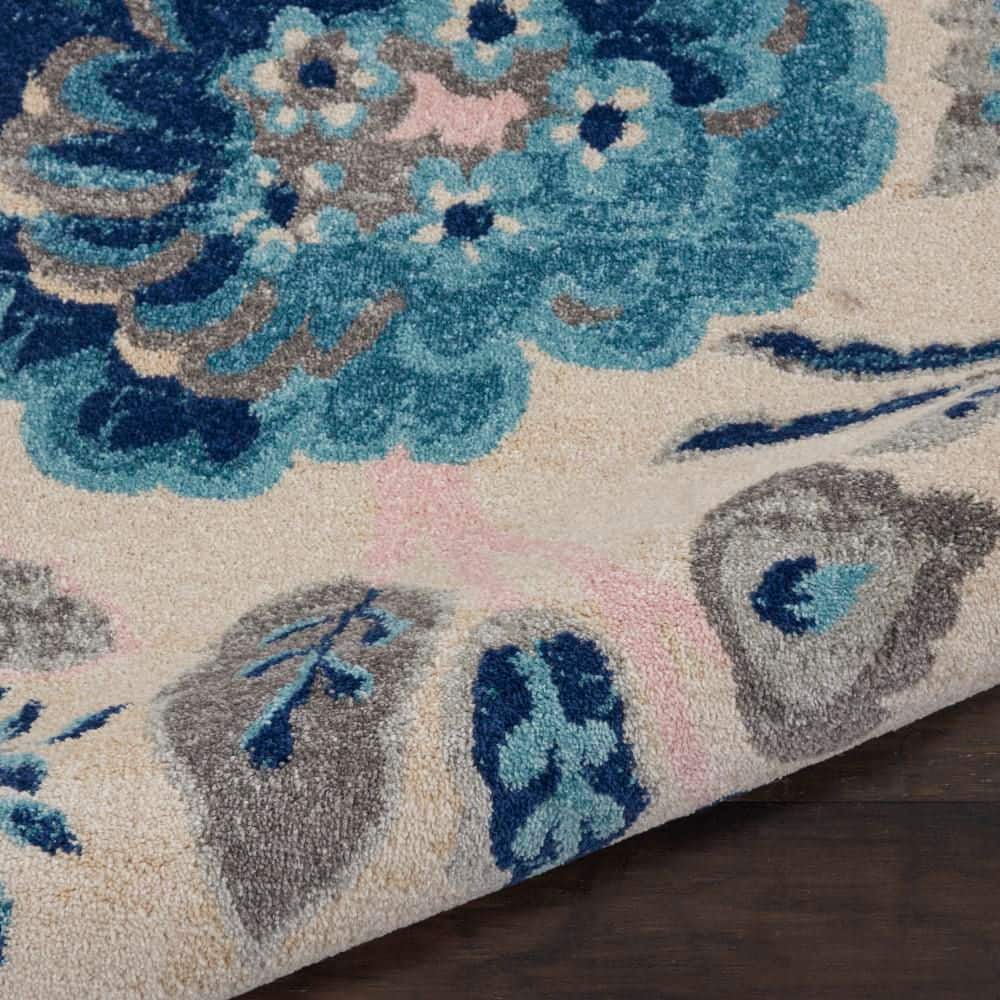 Elegant Ivory and Light Blue Floral 8' x 10' Synthetic Area Rug