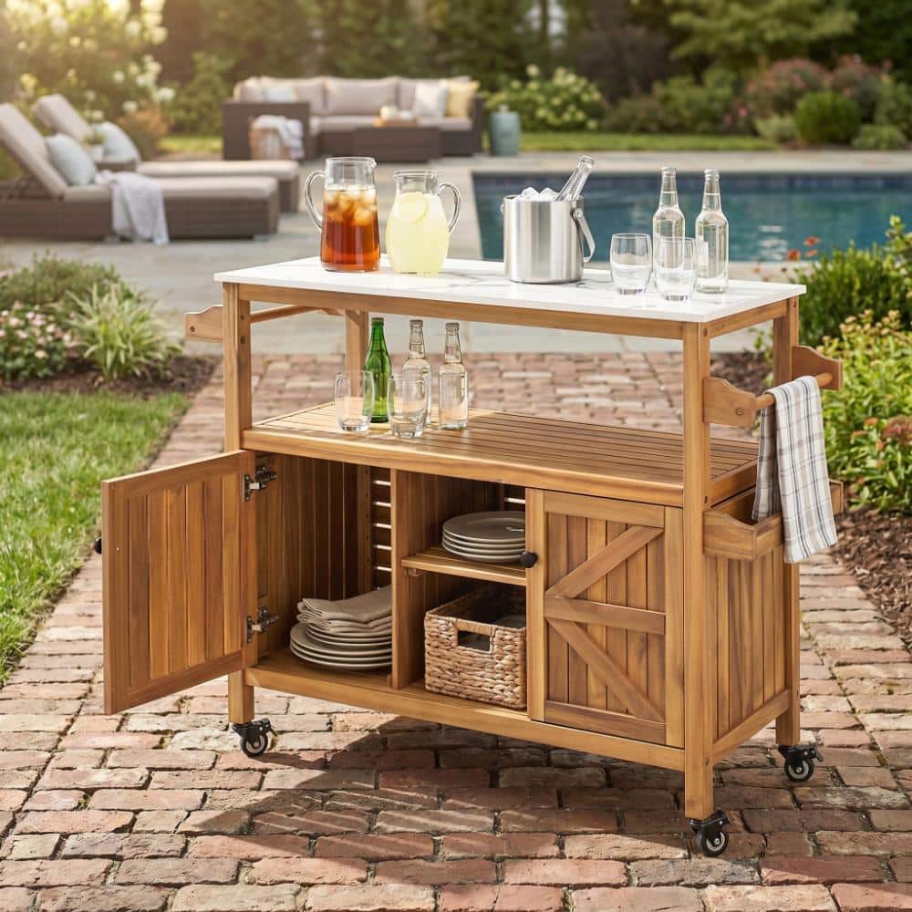 Ridstar natural acacia wood outdoor serving cart placed on a brick patio.