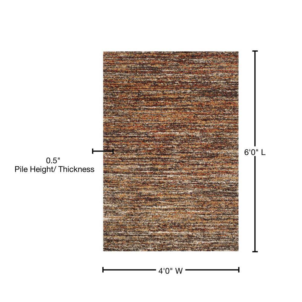 Ivory and Gold Abstract Shag Synthetic Area Rug 4' x 6'