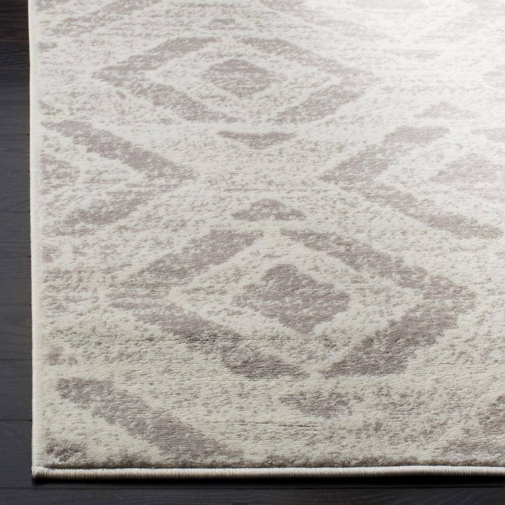 Ivory Medallion Easy-Care 2' x 6' Synthetic Runner Rug