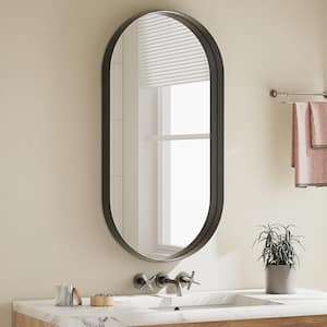 22 in. W x 38 in. H Oval Modern Black Aluminum Alloy Deep Framed Wall Mirror