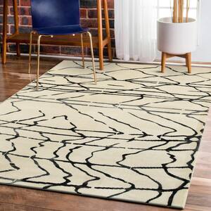 Abstract White / Black Rectangle 7 ft. 9 in. x 9 ft. 5 in. Indoor Area Rug