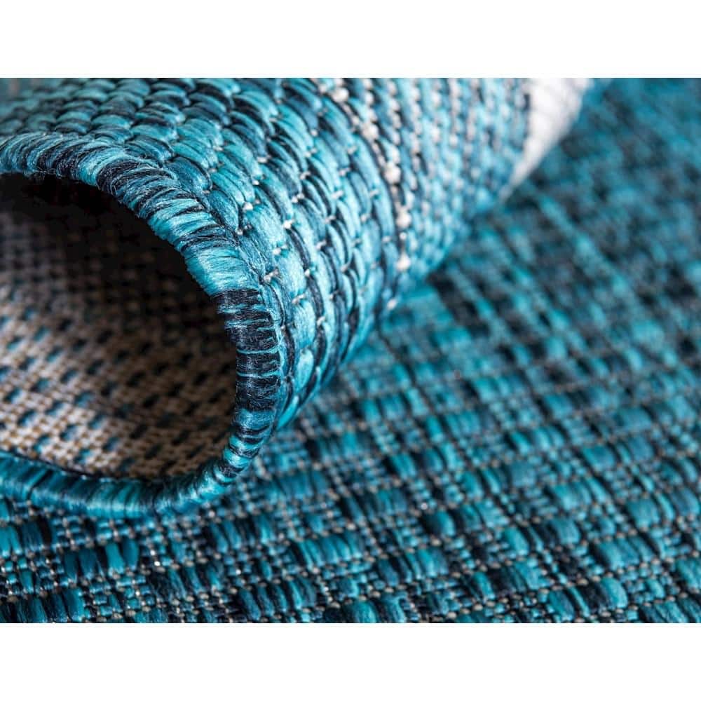 5' x 8' Teal Blue and Beige Flat Woven Outdoor Area Rug