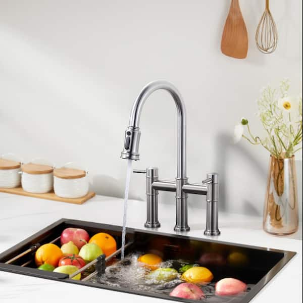 Double Handle Pull-Down High Arc Bridge Kitchen Faucet with Brass and Stainless Steel in Brushed Nickel