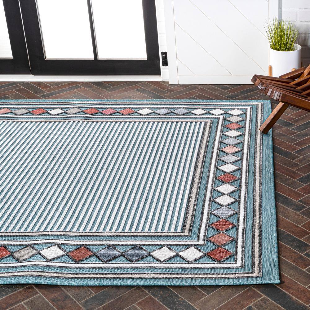 Sebastian Blue and Ivory Geometric Synthetic 5' x 8' Area Rug