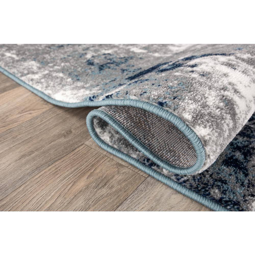 Abstract Blue Tufted Synthetic 7' 10" x 10' Area Rug