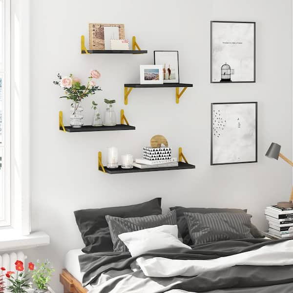 https://images.thdstatic.com/productImages/5f5a9ef1-38e1-42eb-b477-cfb39ab4a7f0/svn/black-gold-decorative-shelving-ny-4pc-2-c3_600.jpg