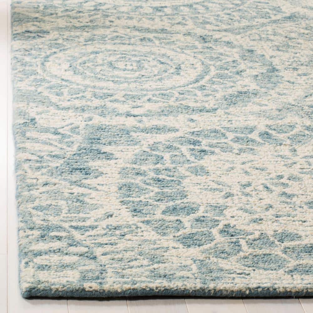 Ivory and Blue Handmade Wool Abstract Tufted Rug, 2' x 3'