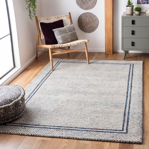 Abstract Ivory/Navy Doormat 2 ft. x 3 ft. Border Geometric Area Rug