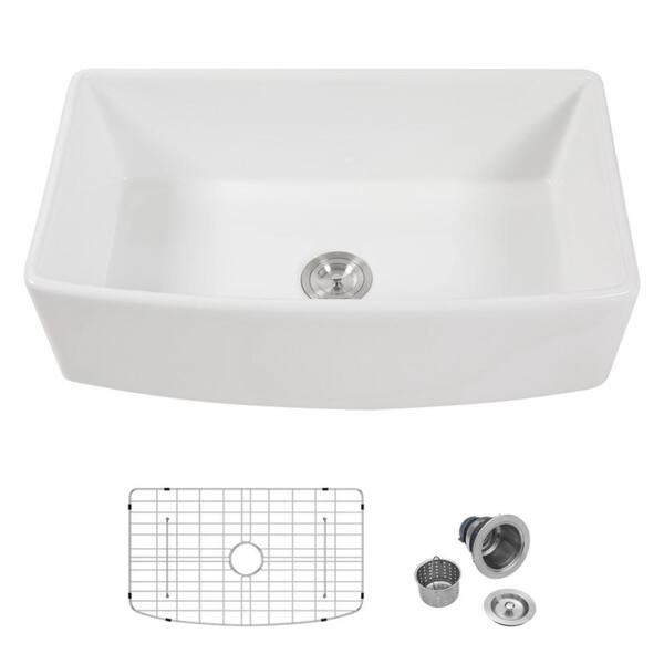 ‌33 in. Curved Apron-Front Farmhouse Single Bowl White Ceramic Kitchen Sink with Bottom Grids & Basket Strainer