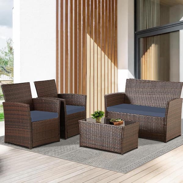 Unbranded 4-Piece Brown Wicker Outdoor Sectional Set with Blue Cushions and Coffee Table