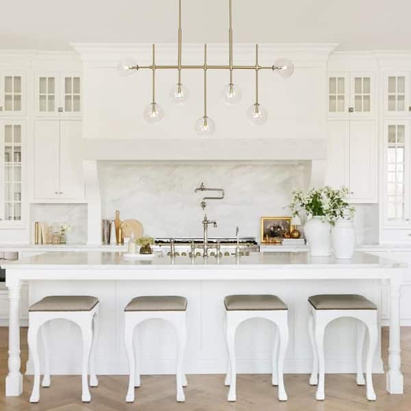 Linear Bloom 7-Light Modern Brass Linear Chandelier with Clear Globe Glass Shades for Kitchen Island