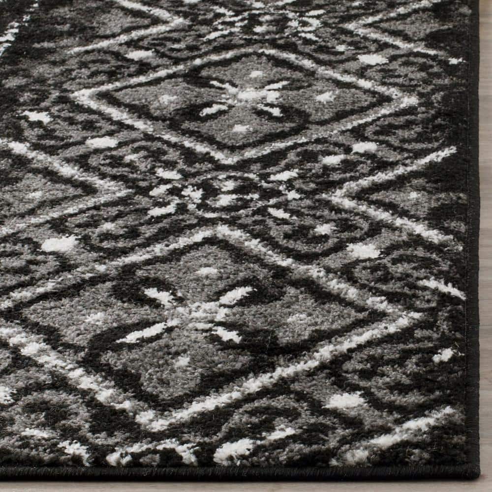 Reversible Black/Silver Geometric Synthetic Area Rug 6' x 9'