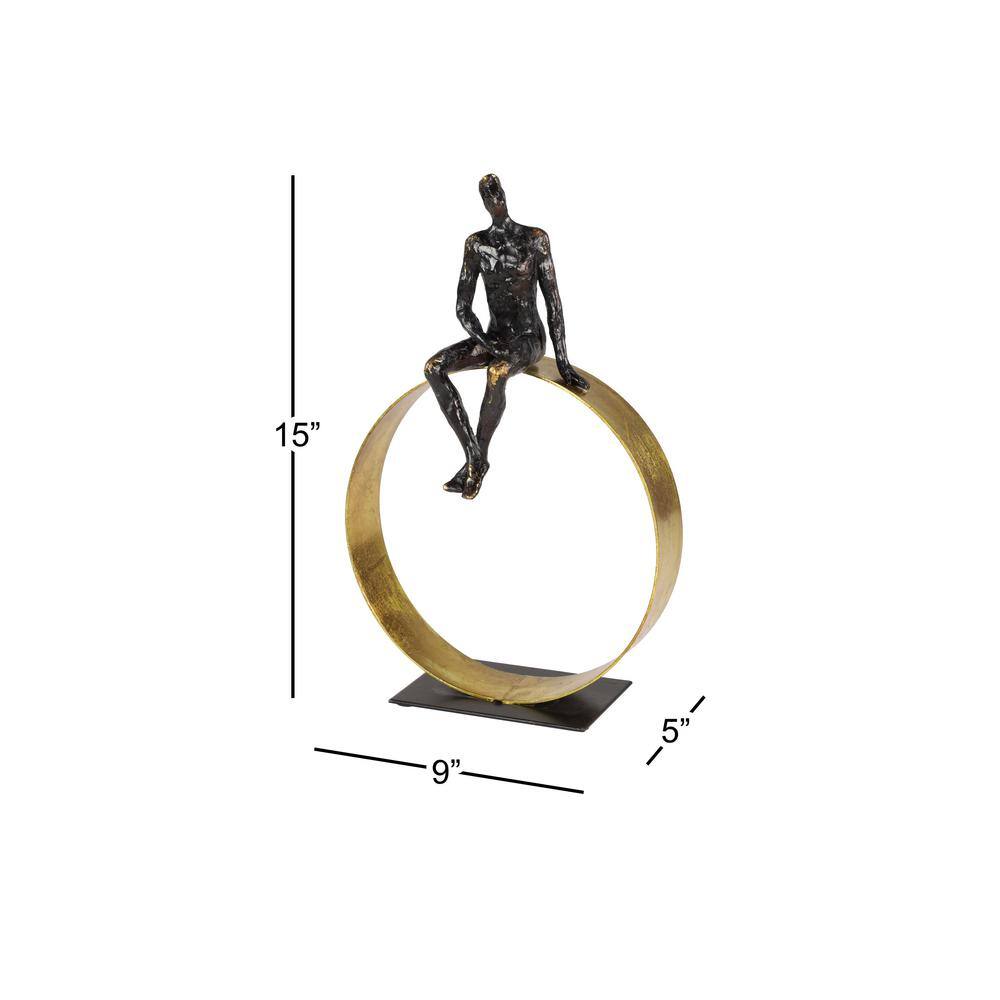 Black and Gold Resin Human Figurine on Circular Base