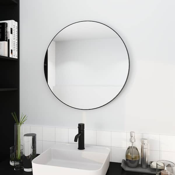Black-and-white-entryway-with-large-round-custom-cut-mirror-design