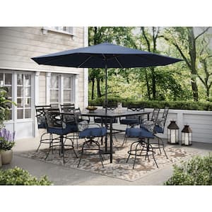 Montclair 9-Piece Steel Outdoor Dining Set with Navy Blue Cushions, 8 Swivel Chairs, 60 in. Table and Umbrella
