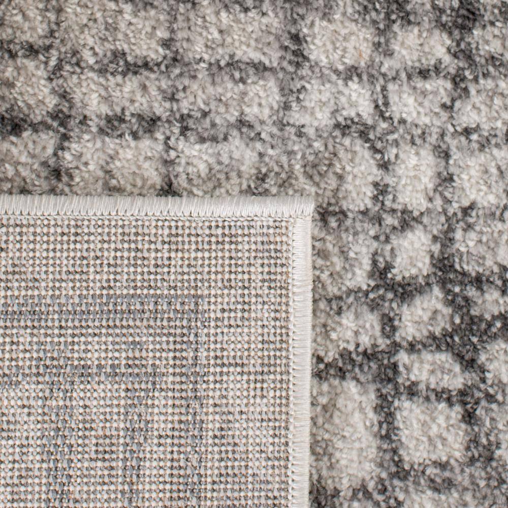 Ivory and Silver Rectangular Synthetic Area Rug, 6' x 9'