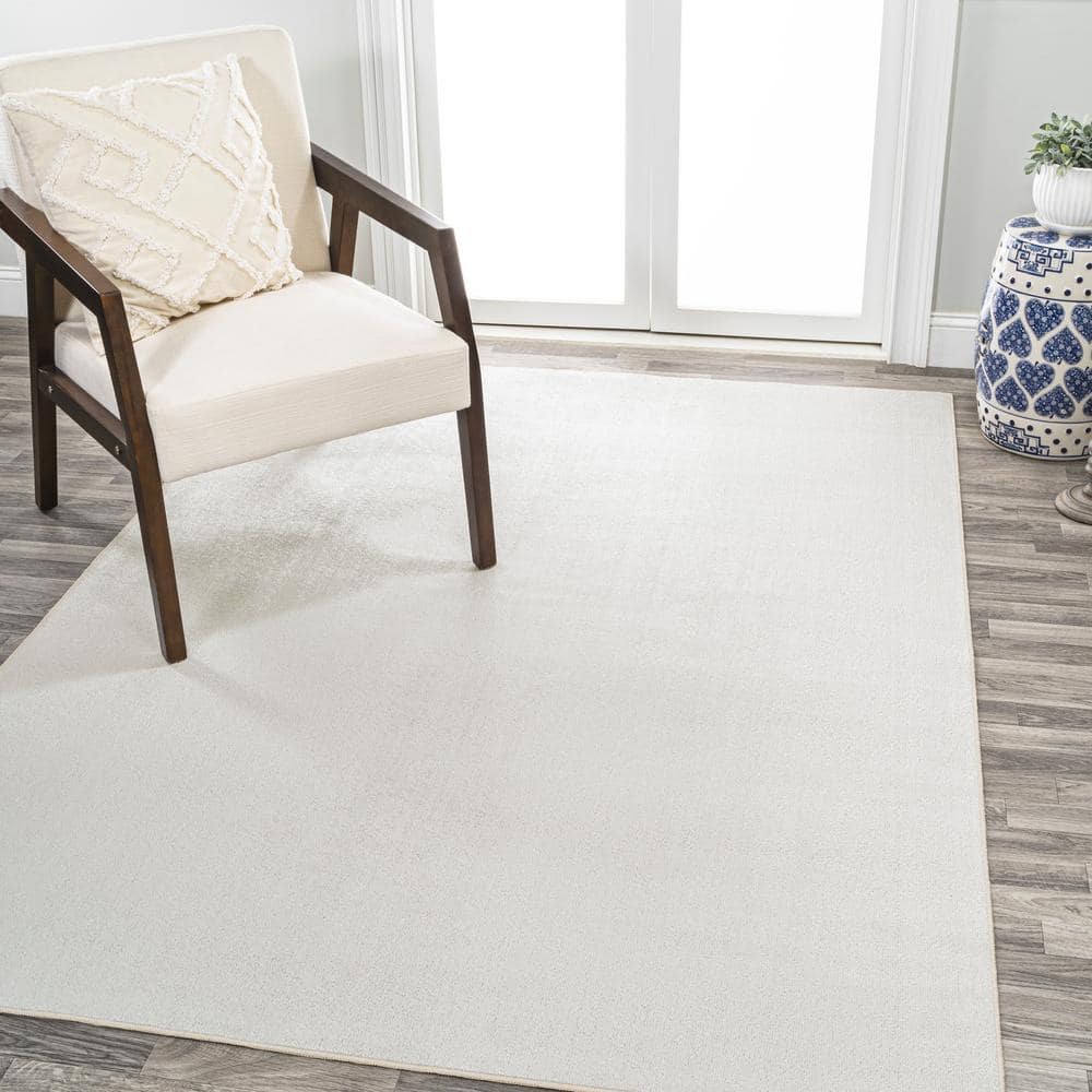 Cream 4' x 6' Synthetic Washable Rectangular Area Rug