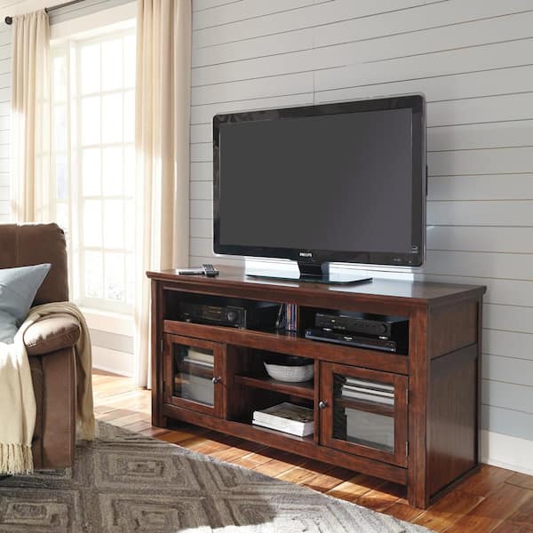 Signature DESIGN BY ASHLEY Harpan Brown TV Stand Fits Tvs Up to 69 in. with Adjustable Shelf